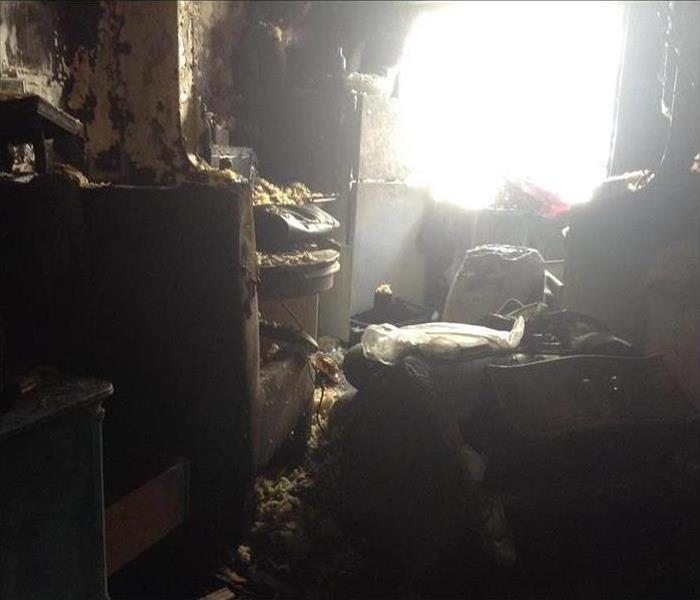 A kitchen destroyed by fire damage